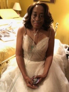 Hospice patient Doris smiles in her beautiful wedding dress just moments before her wedding.