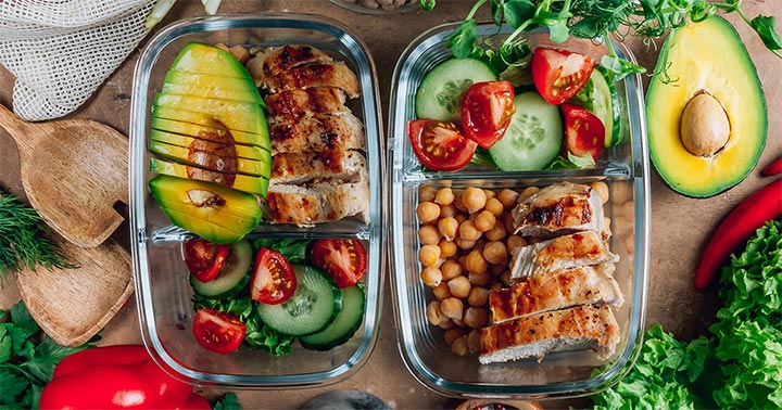 Shows avocado, chicken, chickpeas and colorful fruits and vegetables, all foods that help strengthen muscles